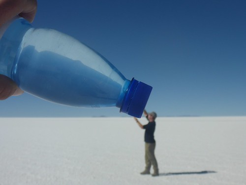 James drinking from a giant water bottle